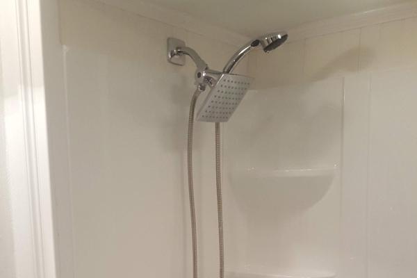 Immerse in luxury with our new shower unit featuring a stylish square shower head and convenient wand attachment. Applause Plumbing delivers excellence, ensuring a seamless installation for your upgraded bathing oasis. Explore our elegant designs and elevate your bathroom experience.