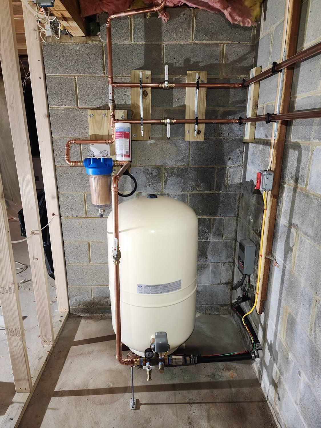 Expert well pump tank and whole-house filtration system installation by Applause Plumbing in Phillipsburg, NJ. Elevate your water quality with advanced plumbing technology for purity and safety in your home.